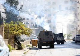 إصابات واعتقالات خلال اقتحام مناطق متفرقة بالضفة